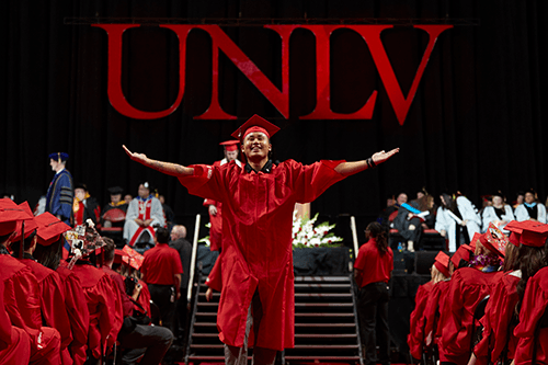 A happy graduate at UNLV commencement. 
